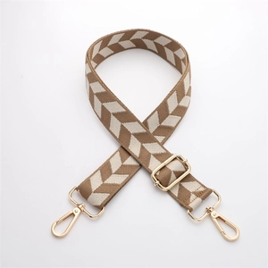 Detail of adjustable beige herringbone woven strap with high-quality gold metal hooks
