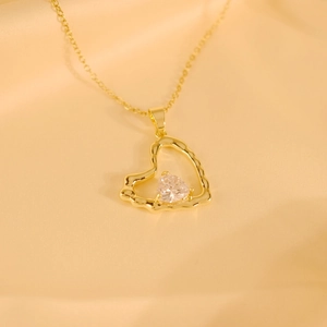 Elegant gold stainless steel heart pendant necklace with shimmering white zircon crystal