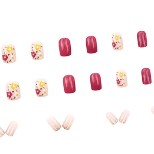 Short square press-on nails set featuring dream purple floral patterns and pink glitters
