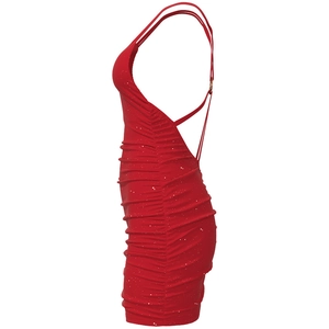 Detail of red ruched mini dress with sparkling rhinestones and slim shoulder straps