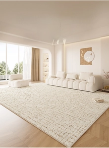 Detail of cream-colored waterproof living room carpet with textured loop pile surface