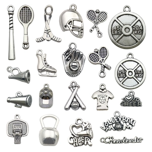 Assorted silver sports charms including basketball, football and gym weights for DIY jewelry