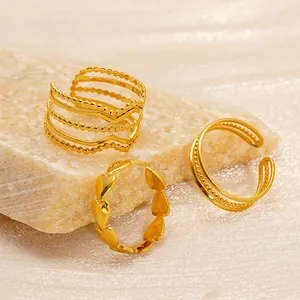 Three-piece stackable 18K gold stainless steel heart and beaded line rings set