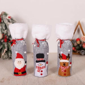 Three-piece Christmas wine bottle covers with Santa, Snowman and Reindeer felt designs