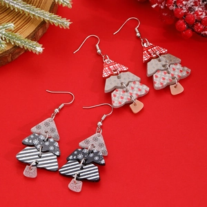 Festive Christmas tree dangle earrings set with red and black acrylic holiday patterns
