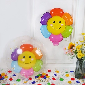 Rainbow smiley flower foil balloon inside a transparent daisy printed balloon display