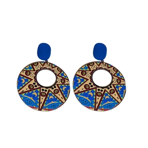 Bohemian geometric round drop earrings with vibrant colorful star pattern on white background