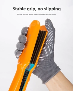 Detail view of orange hair straightener with heat resistant silicone dotted gloves