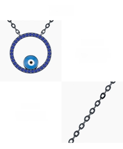 Detail of 925 sterling silver evil eye pendant with blue lapis and link chain texture