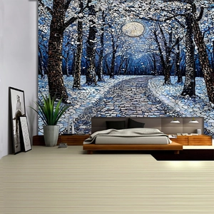 Modern wall tapestry featuring a snowy forest and full moon in a cozy bedroom setting
