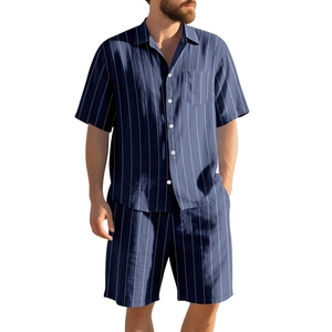 Close-up of deep blue linen shirt and shorts set featuring white vertical stripes and texture