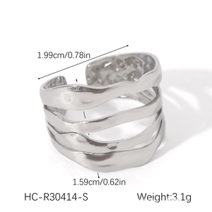 Detail showing irregular molten texture and dimensions of the silver open ring