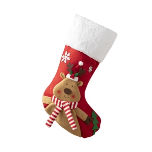 Classic red Christmas stocking with plush cuff and 3D reindeer design for holiday decoration