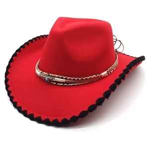 Red western cowboy hat with black zigzag trim and turquoise buckle detail