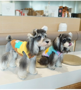 Close-up of winter warm polar fleece dog vest with color-block design and embroidery