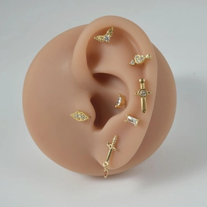 Golden stainless steel wing and sword zircon stud earrings set for ear cartilage and lobes