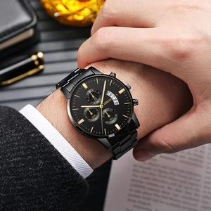 Close-up of Geneva men's business watch with luminous markers and calendar display