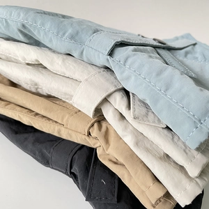 Detailed view of quick-dry nylon fabric texture and stitching on lightweight pants