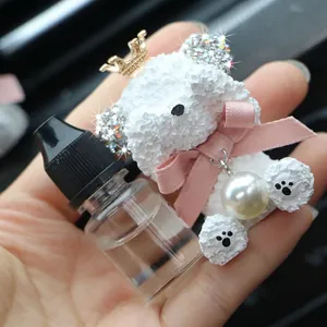 Sparkling teddy bear car vent clip with golden crown and aromatherapy oil bottle