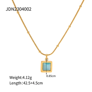 Detail of square blue opal necklace with gold beaded chain showing dimensions 0.85cm