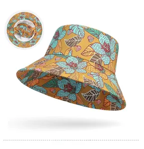 Detail of floral bucket hat featuring a clever hidden mask for full facial sun protection
