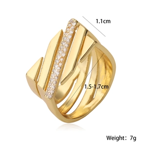Detail showing 1.1cm width and 1.5-1.7cm inner diameter of the gold zircon open ring