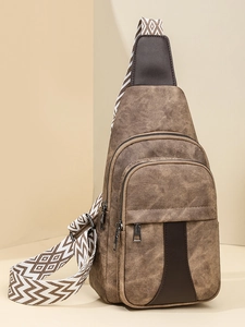 Brown vintage style sling bag for women with geometric wide strap and retro texture