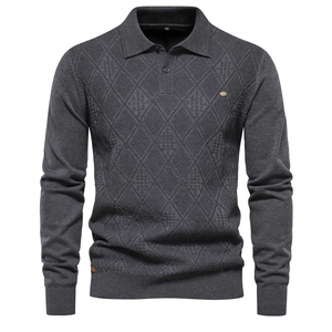 Detail of dark grey knit polo sweater showing premium diamond texture and metal logo