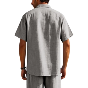 Rear view of grey linen short-sleeve shirt showing breathable fabric texture and relaxed fit