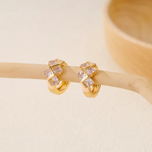 Detail of 18K gold-plated hoop earrings featuring triple square-cut zircon stones