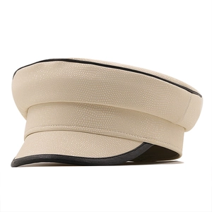 Chic cream textured leather baker boy hat with black piping trim for vintage style