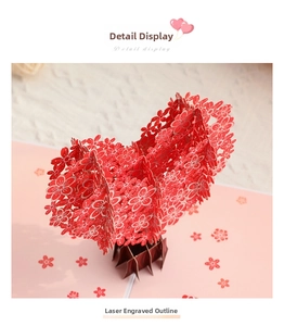 Detailed laser-cut 3D pop-up greeting card featuring a delicate red cherry blossom tree