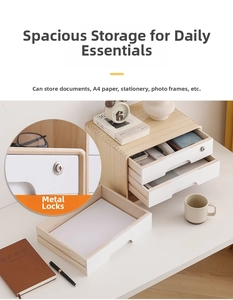 Detailed view of wooden desk organizer featuring white drawers and secure metal hardware lock