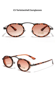Detailed macro view of vintage tortoise shell oval sunglasses with UV400 protection