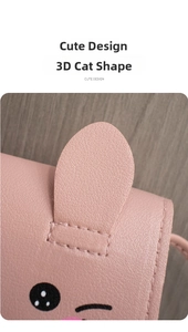 Close-up of pink faux leather crossbody bag featuring 3D cat ears and cute printed face
