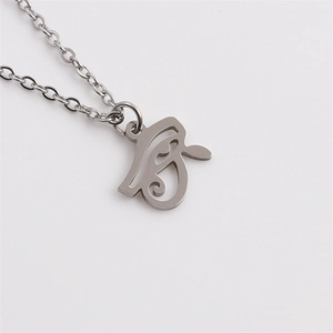 Polished silver stainless steel necklace with Egyptian Eye of Horus pendant on white background