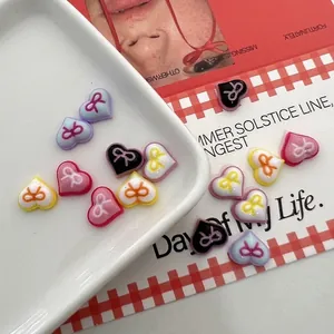 Sweetheart Barbie resin nail art charms with colorful bows in various mixed colors