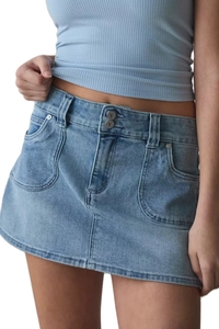 Close-up of light blue high-waisted denim skirt with double button closure and pockets