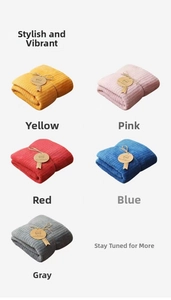 Soft ribbed coral fleece bath towels in various colors with rustic paper tags