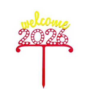 Detailed view of 2026 Happy New Year acrylic cake topper in vibrant red and yellow colors