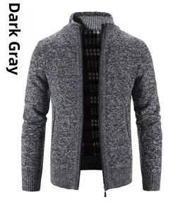 Detail of dark grey knit cardigan with high collar and red checkered fleece lining