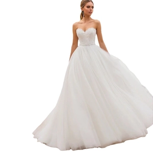 Elegant strapless white lace ball gown wedding dress with a layered tulle skirt