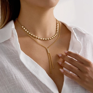 Collier en Y superposé plaqué or 18 carats avec glands en strass et cristaux sertis