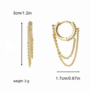 Gold hoop earrings with tassel chains and cubic zirconia in a modern cyberpunk style