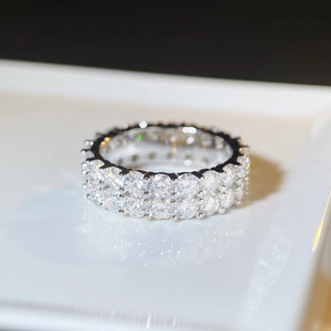 Macro shot of S925 sterling silver ring with double row of round moissanite stones