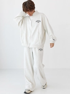 Full view of light grey cotton tracksuit with embroidered logo and zip-up collar details