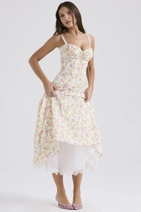 Detail shot of a French floral midi dress with delicate lace hem and vintage print