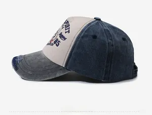 Side view of vintage patchwork baseball cap with distressed brim and custom embroidery