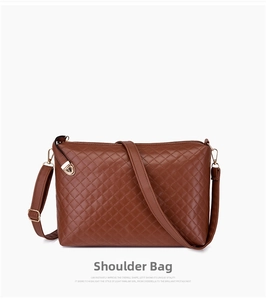 Detail of brown quilted shoulder bag featuring gold-tone hardware and adjustable strap