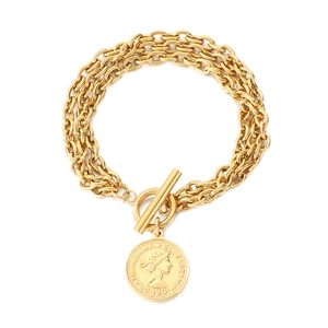 Gold multi-layer stainless steel bracelet with coin pendant and OT toggle clasp